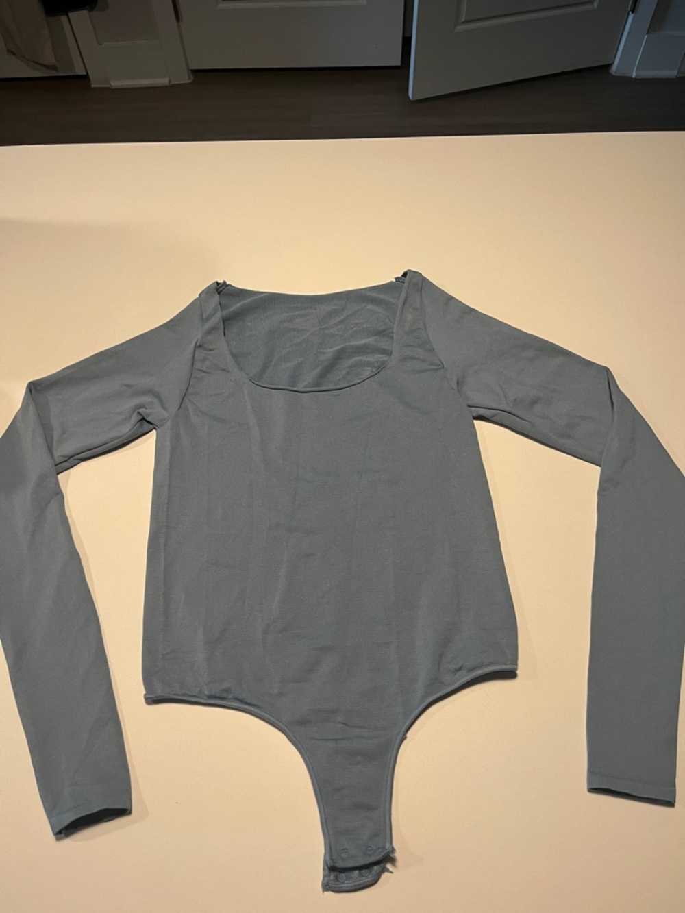 SKIMS Baby Blue Essential Long Sleeve Thong Bodysuit S/M